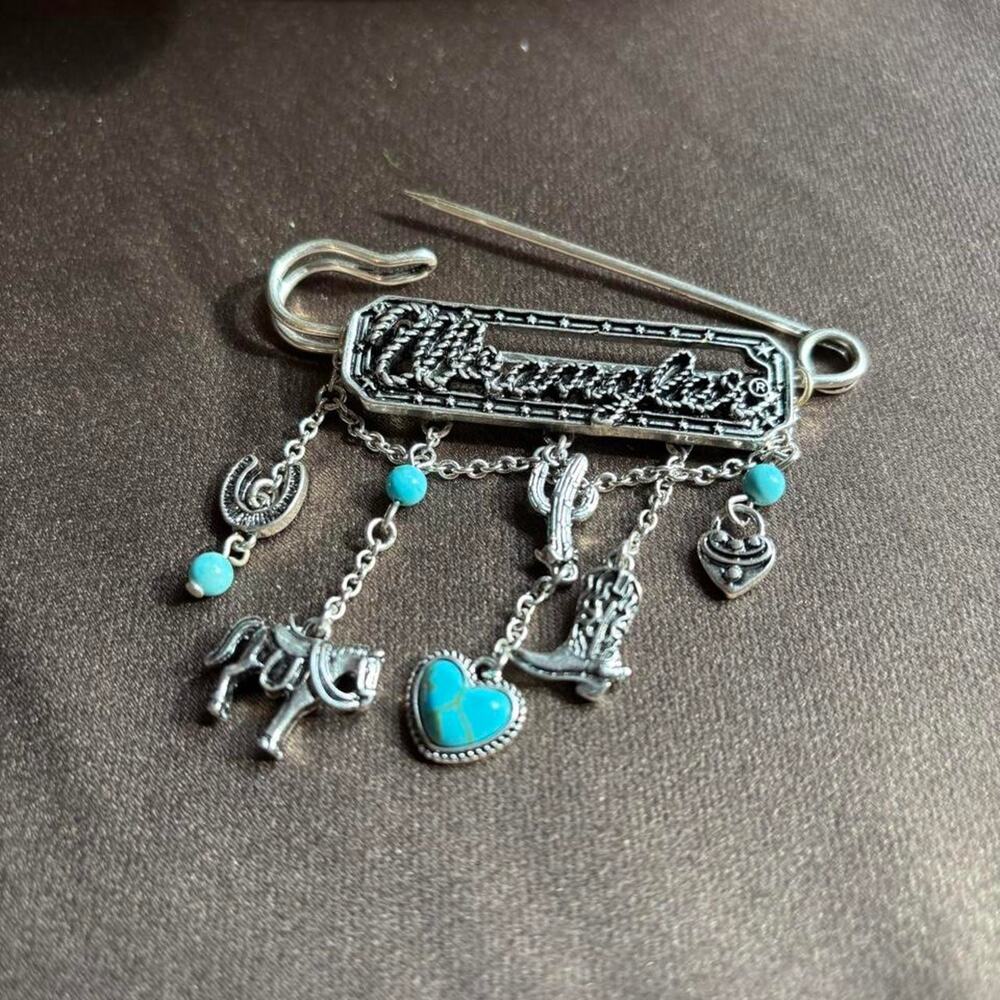 Wrangler-branded silver-tone western safety pin brooch - Picture 2 of 5